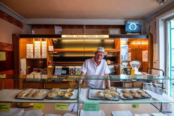 Colin Greenhall, baker, in his shop in St Helens