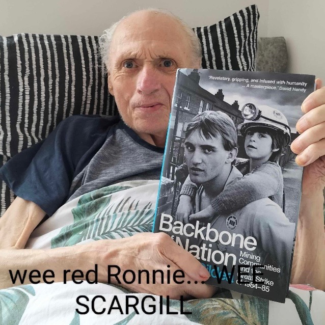 ‘Red Ronnie’ Campbell holding a copy of Robert’s book, Backbone of the Nation.