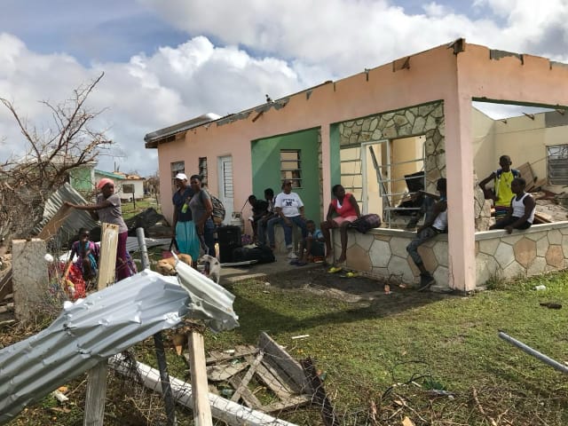 Hurricane Irma was a category 5 Atlantic Hurricane which caused destruction across the Antilles in early September 2017. Hurricane Maria stuck two weeks later. Read about the impacts of these extreme weather events in Puerto Rico in Ricia Anne Chansky’s article in Oral History, 54.2 (2026), pp 69-81. The photograph shows the island of Barbuda, whose population was mostly evacuated in the wake of Hurricane Irma. Photo: © Gulliver Johnson.