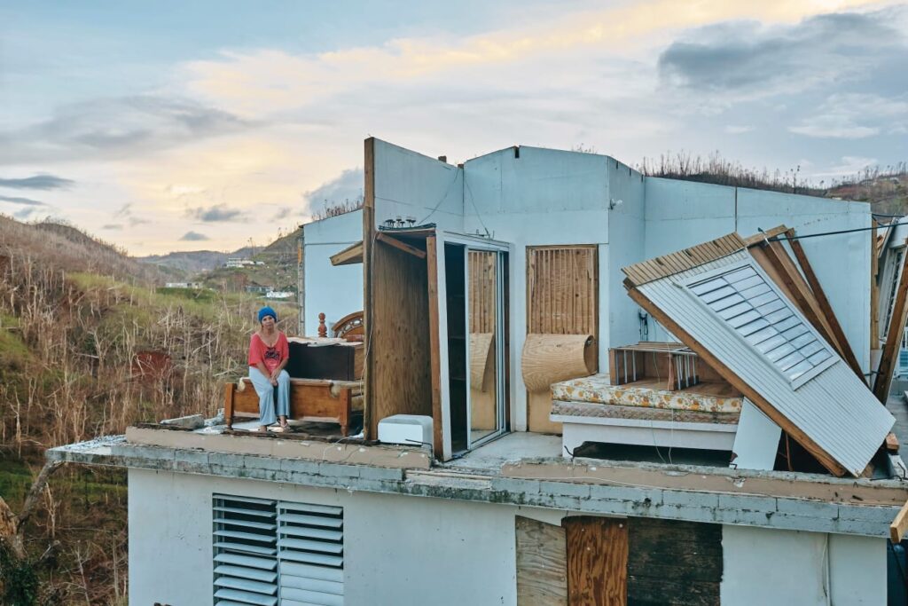 Wilmair Flores posing on a bed at her house in Barranquitas, Puerto Rico on 2 October 2017
